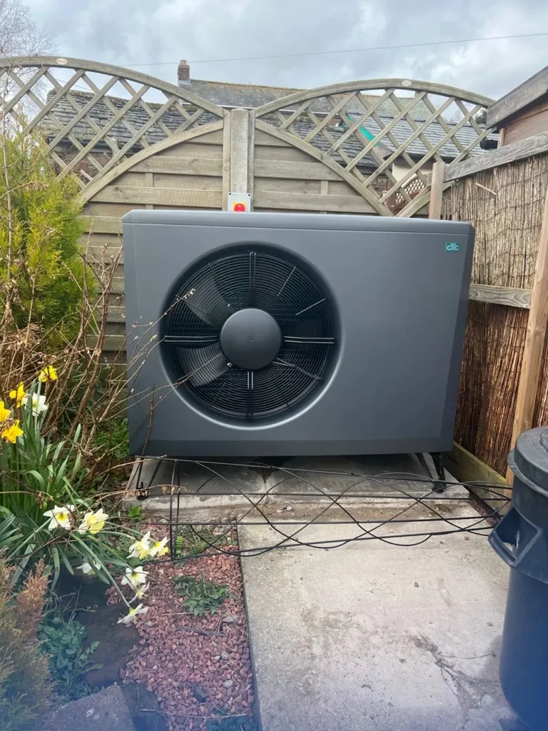 CTC 22kW 3-phase air source heat pump installed outdoors in a residential setting.