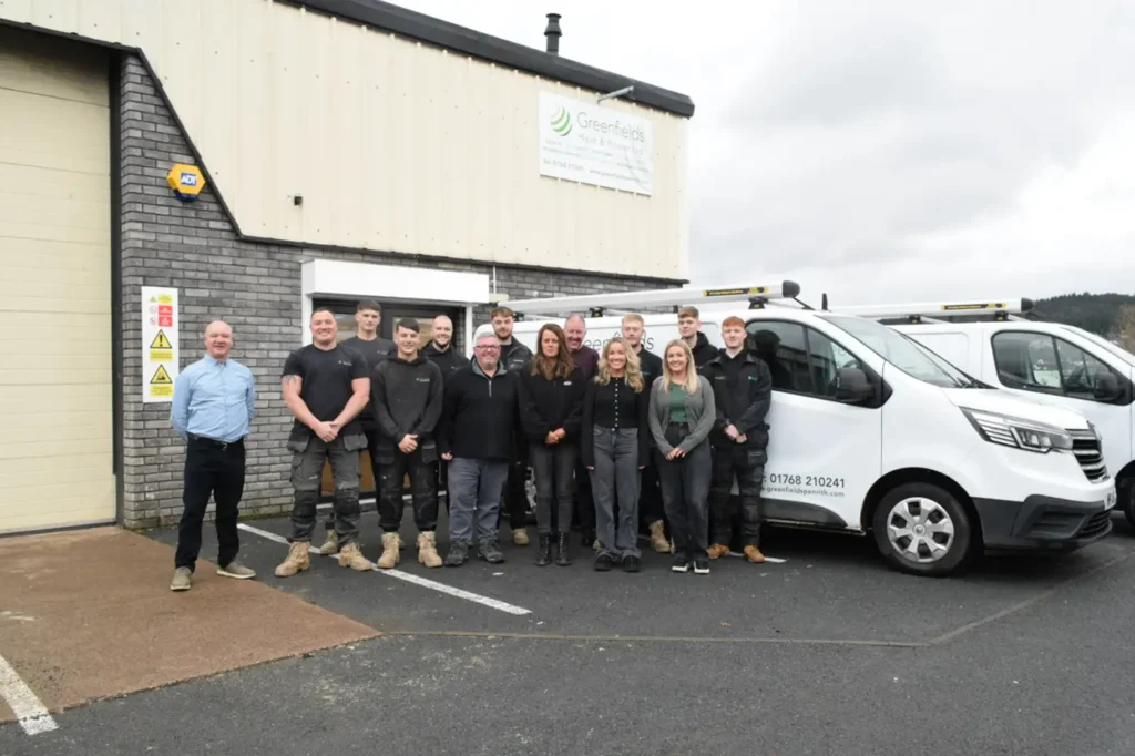Greenfields Heat and Power team standing outside their new office.