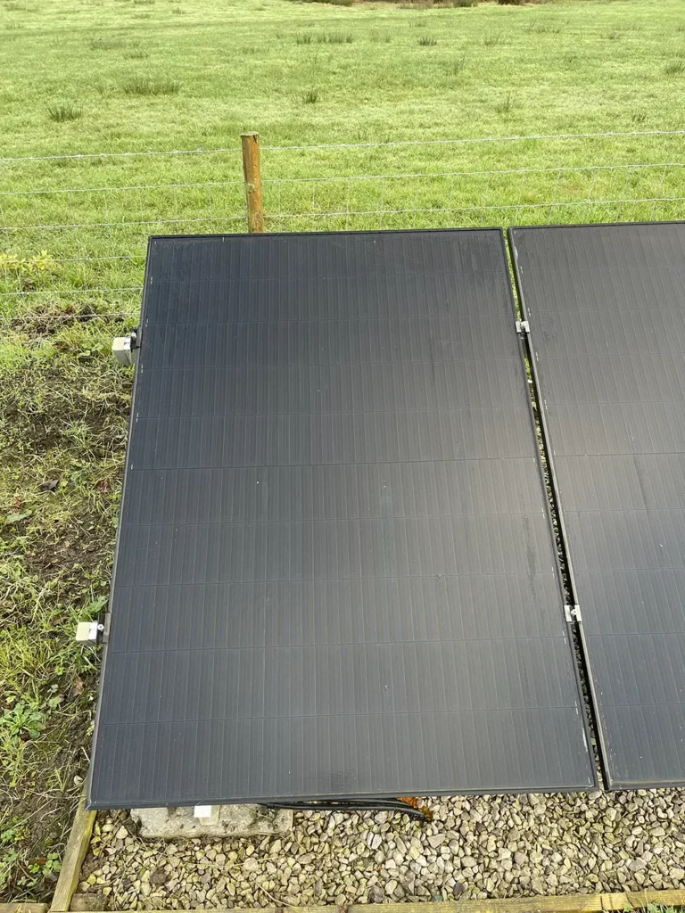 Close-up view of a solar PV panel in a ground-mounted system.
